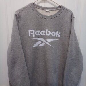 Gray Reebok sweatshirt .No tag. Approx measure ments 25" pit to pit 27" s to h